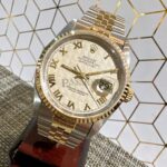 1994 Rolex 36mm Oyster Perpetual "Datejust" Chronometer Ref.16233 beige pyramid & Roman dial in 18KYG & Steel